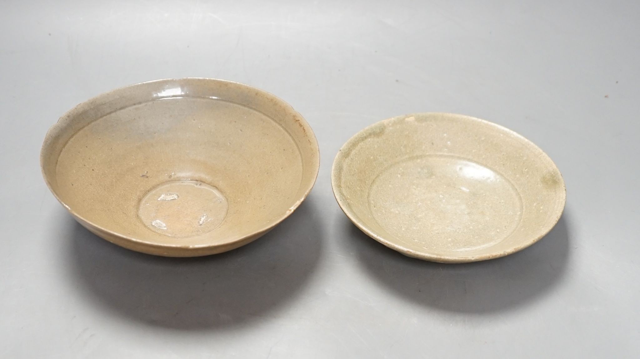 Two Korean celadon bowls or dishes, Goreyo dynasty., largest 17 cms diameter.